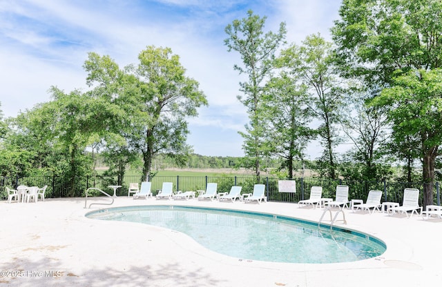 135 Live Oak Dr, Leland, NC 28451 - pool with a patio and fence