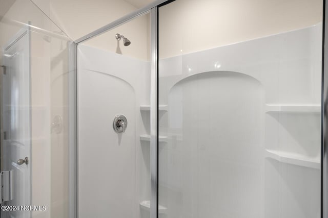 bathroom with a stall shower
