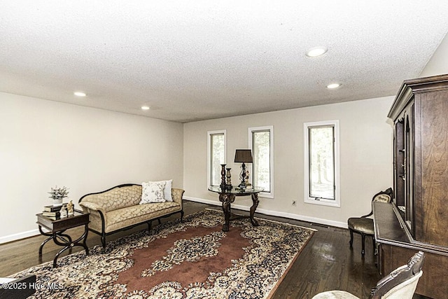 7730 Old Raleigh Rd, Bailey, NC 27807 - sitting room featuring a textured ceiling, baseboards, recessed lighting, and dark wood-style floors