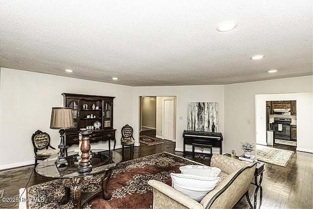 7730 Old Raleigh Rd, Bailey, NC 27807 - living room with a textured ceiling, baseboards, hardwood / wood-style floors, and recessed lighting