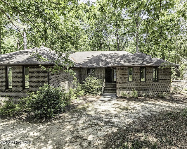 7730 Old Raleigh Rd, Bailey, NC 27807 - single story home featuring a shingled roof and brick siding