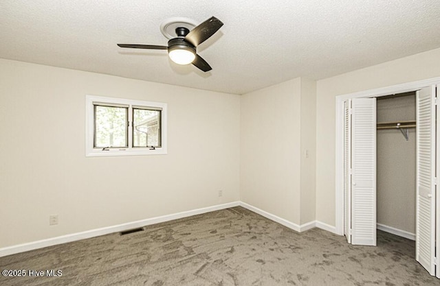 7730 Old Raleigh Rd, Bailey, NC 27807 - unfurnished bedroom with a closet, carpet, visible vents, a ceiling fan, and baseboards