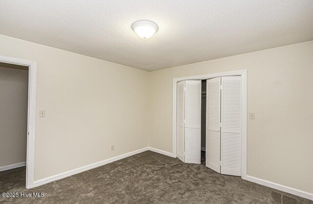 7730 Old Raleigh Rd, Bailey, NC 27807 - washroom featuring a textured ceiling, washing machine and dryer, and cabinet space