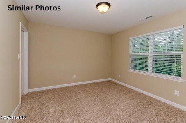 153 Tides End Dr, Holly Ridge, NC 28445 - empty room with carpet floors and baseboards