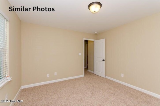 153 Tides End Dr, Holly Ridge, NC 28445 - spare room with carpet flooring and baseboards