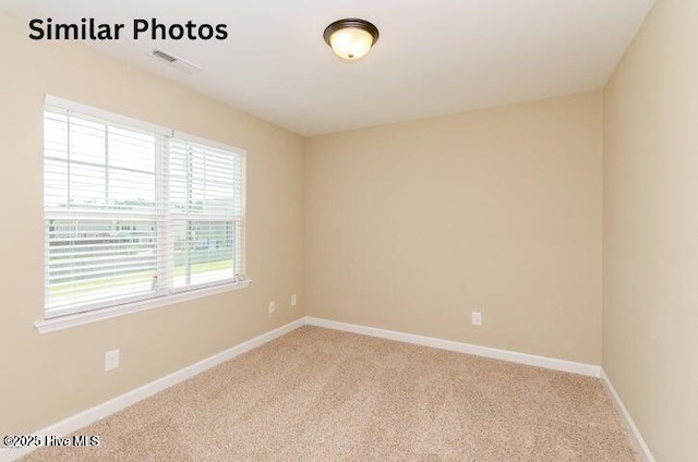 153 Tides End Dr, Holly Ridge, NC 28445 - spare room with light colored carpet and baseboards