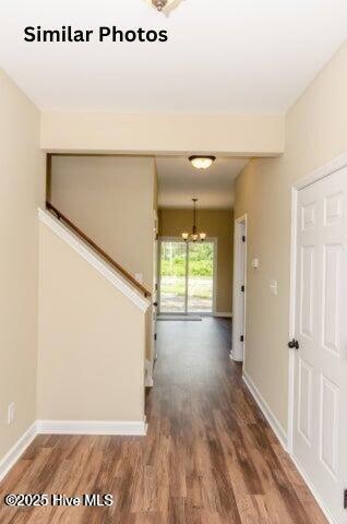 153 Tides End Dr, Holly Ridge, NC 28445 - corridor featuring wood finished floors, a chandelier, and baseboards