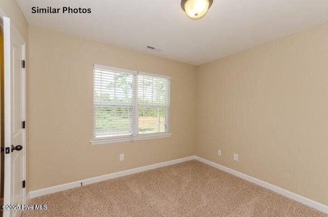 153 Tides End Dr, Holly Ridge, NC 28445 - carpeted spare room featuring baseboards