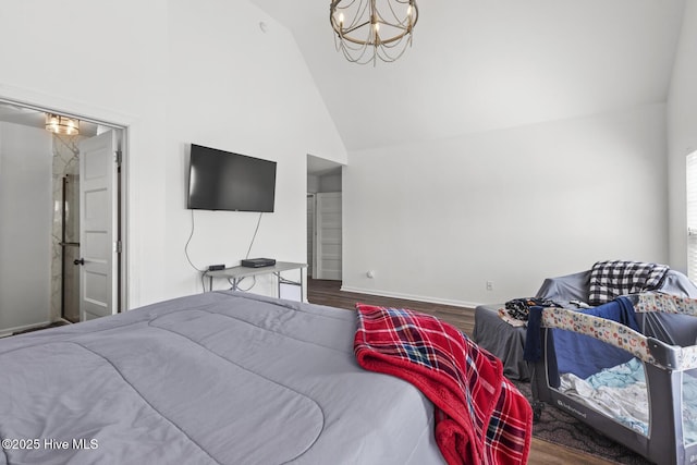bedroom with baseboards, high vaulted ceiling, an inviting chandelier, and wood finished floors