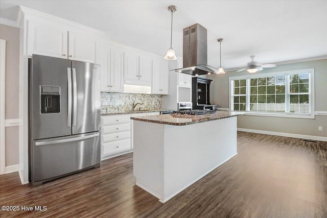 kitchen featuring island range hood, dark wood-style floors, white cabinets, a ceiling fan, and appliances with stainless steel finishes