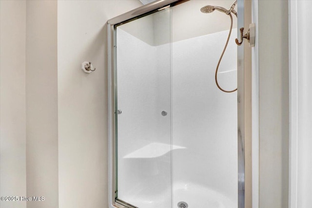 full bathroom with a stall shower