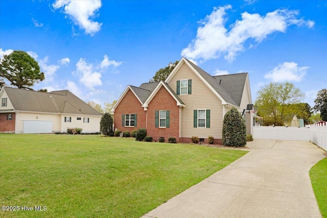 view of front of home with fence, concrete driveway, a front lawn, and crawl space