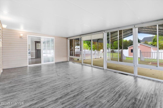 interior space with a wealth of natural light and wood finished floors