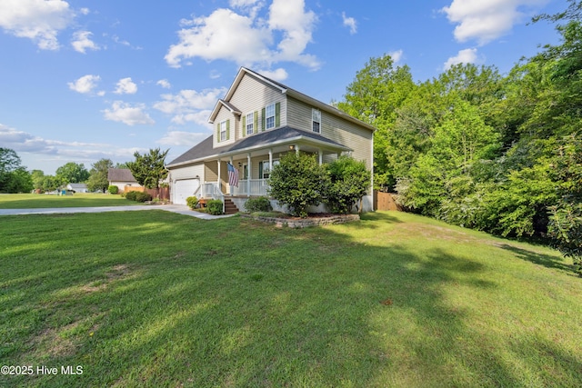 view of front facade featuring a porch, an attached garage, a front yard, and concrete driveway