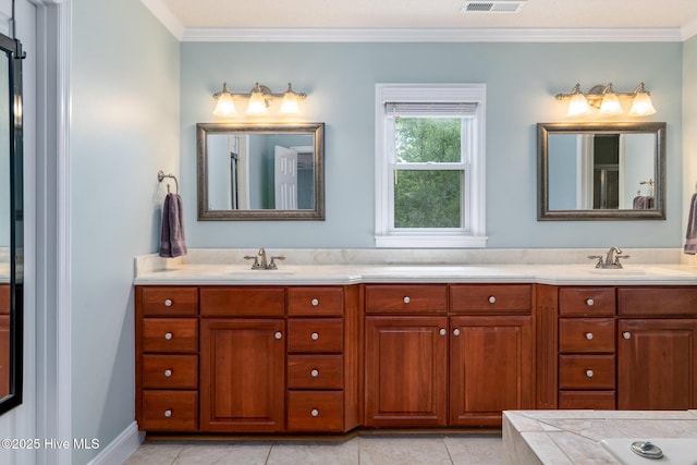 full bath with a sink, double vanity, and ornamental molding