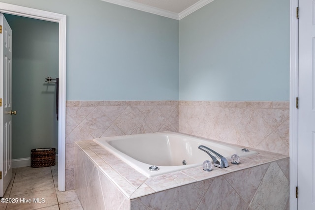 full bath featuring tile patterned floors, a garden tub, and ornamental molding