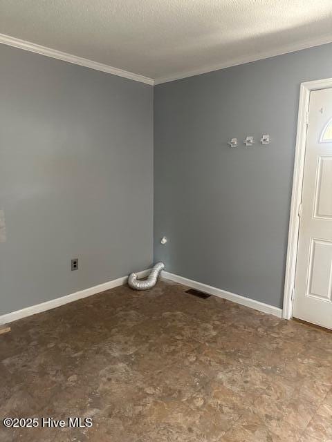 714 S Brown Rd, Enfield, NC 27823 - unfurnished room with crown molding, baseboards, and visible vents