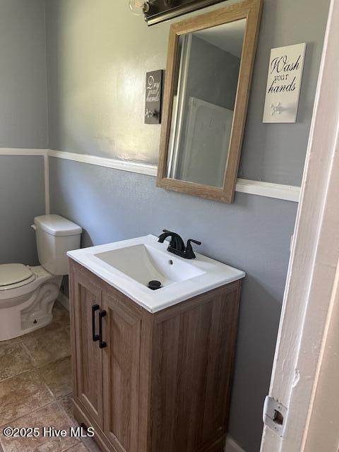 714 S Brown Rd, Enfield, NC 27823 - bathroom featuring vanity and toilet