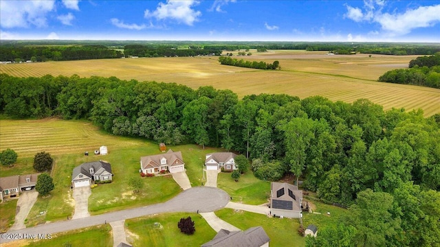 birds eye view of property featuring a rural view