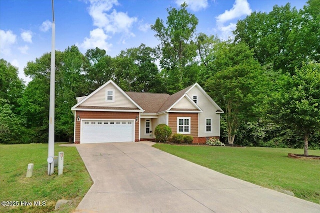 view of front of property with driveway, a front lawn, and a garage
