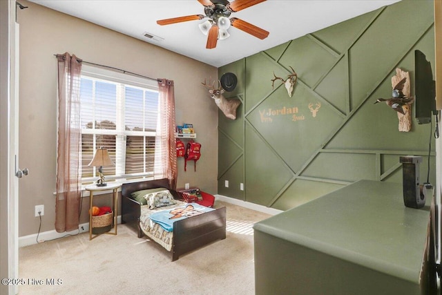 bedroom with baseboards, ceiling fan, carpet, and visible vents