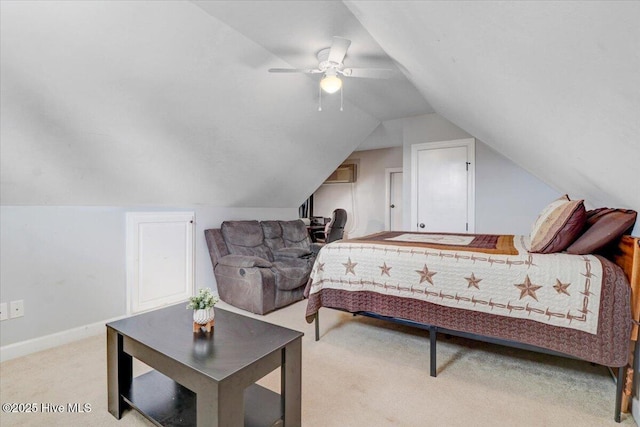 bedroom featuring baseboards, vaulted ceiling, light carpet, and ceiling fan