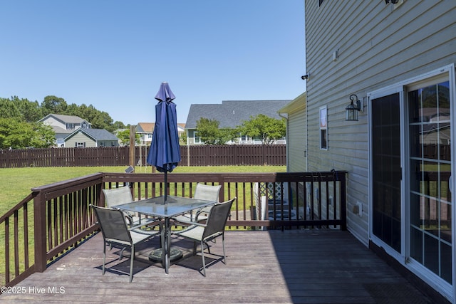 108 Nellie Ln, Swansboro, NC 28584 - deck with a yard, fence, and outdoor dining space