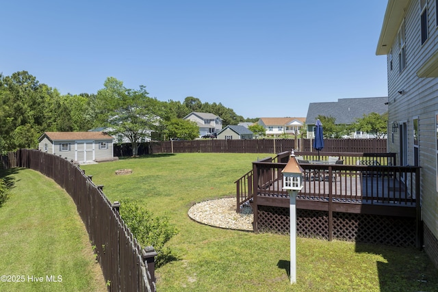 108 Nellie Ln, Swansboro, NC 28584 - view of yard featuring a deck, a residential view, and a fenced backyard