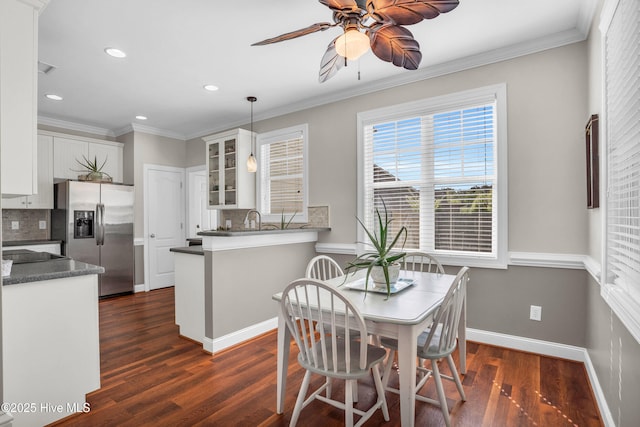 167 Fallbrook Ln, Rocky Point, NC 28457 - dining room featuring ceiling fan, crown molding, baseboards, dark wood-style floors, and recessed lighting