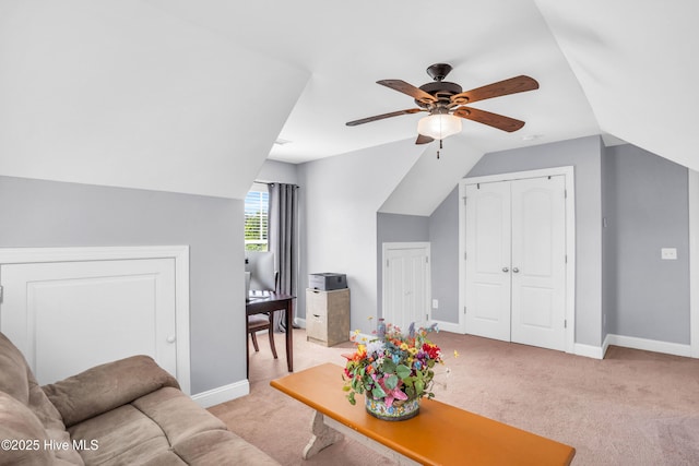 167 Fallbrook Ln, Rocky Point, NC 28457 - living room with light colored carpet, baseboards, ceiling fan, and vaulted ceiling