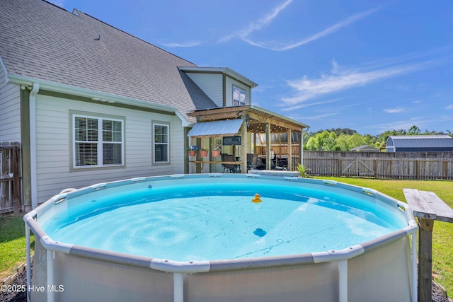167 Fallbrook Ln, Rocky Point, NC 28457 - view of pool with a fenced in pool, a fenced backyard, and a lawn
