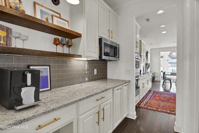 kitchen with open shelves, white cabinets, backsplash, and appliances with stainless steel finishes