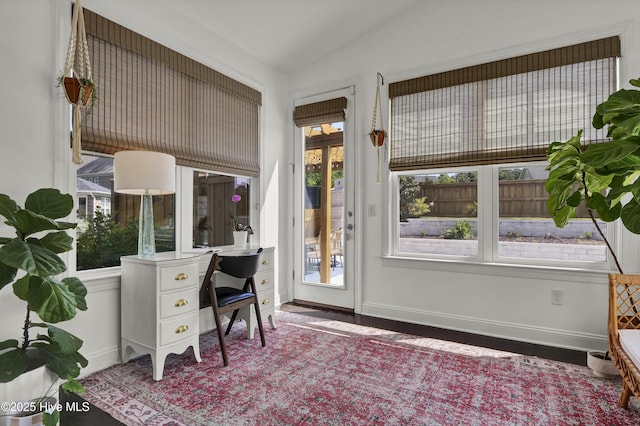 office area with baseboards and wood finished floors