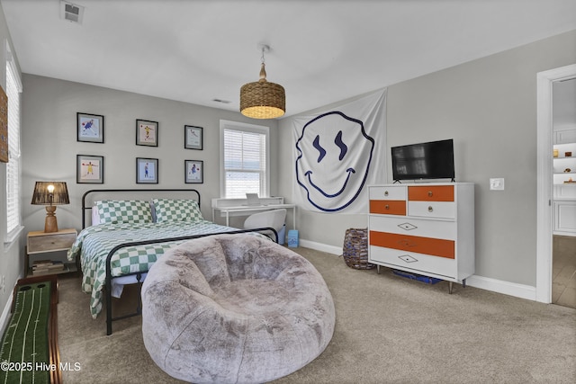 bedroom with carpet, baseboards, and visible vents