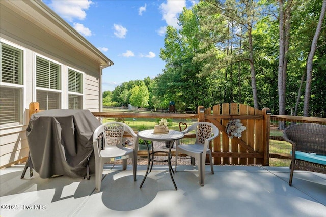 549 Abbey Rd, Carthage, NC 28327 - view of patio / terrace featuring area for grilling, fence, and view of wooded area