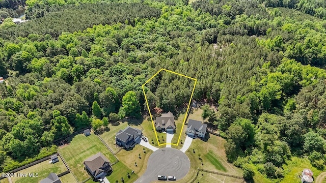 549 Abbey Rd, Carthage, NC 28327 - aerial view of property and surrounding area featuring a heavily wooded area and property boundaries highlighted