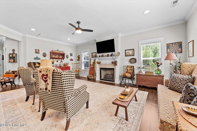 549 Abbey Rd, Carthage, NC 28327 - living room with wood finished floors, a ceiling fan, crown molding, recessed lighting, and a fireplace
