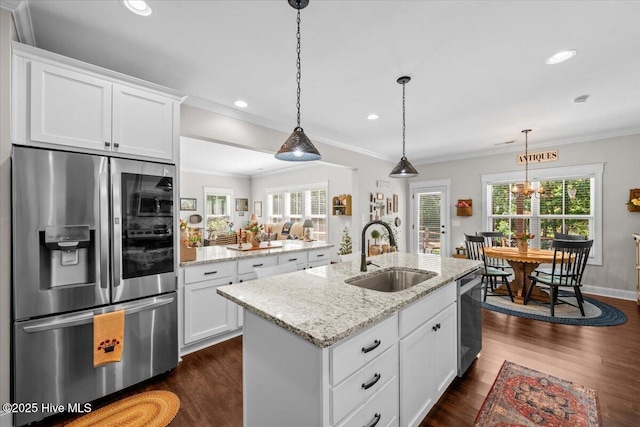 549 Abbey Rd, Carthage, NC 28327 - kitchen featuring appliances with stainless steel finishes, a sink, an island with sink, white cabinets, and crown molding