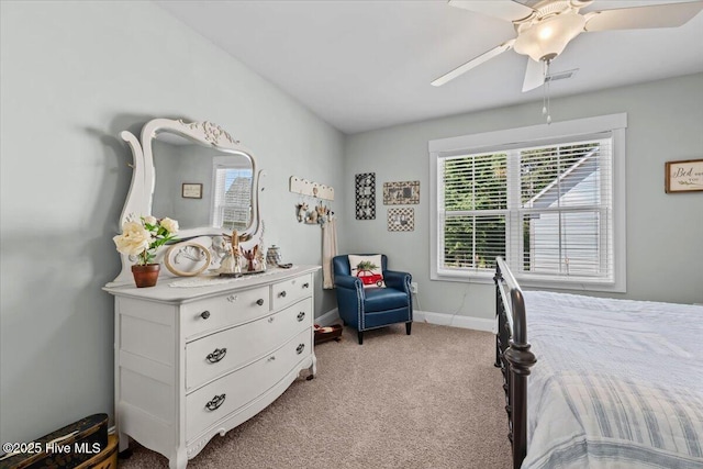 549 Abbey Rd, Carthage, NC 28327 - carpeted bedroom featuring multiple windows, baseboards, and a ceiling fan