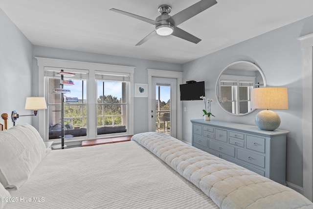 bedroom featuring access to outside and a ceiling fan