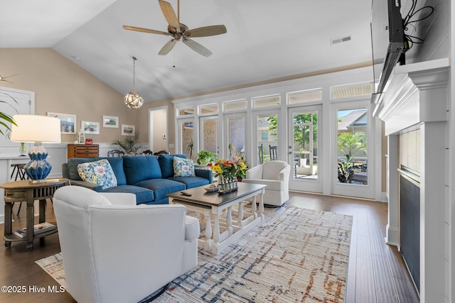 9036 Island Rider Ct NE, Leland, NC 28451 - living room with visible vents, a ceiling fan, wood finished floors, and vaulted ceiling