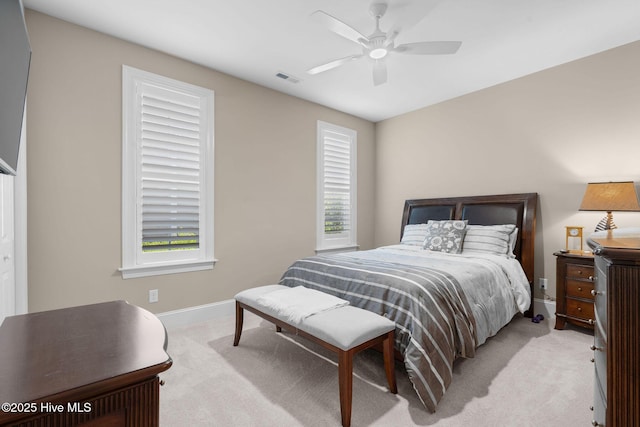 9036 Island Rider Ct NE, Leland, NC 28451 - bedroom with baseboards, ceiling fan, carpet, and visible vents