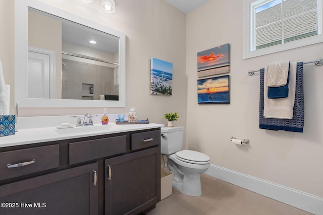 9036 Island Rider Ct NE, Leland, NC 28451 - full bathroom featuring tile patterned flooring, vanity, toilet, baseboards, and walk in shower