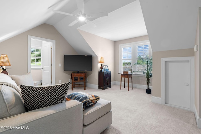 9036 Island Rider Ct NE, Leland, NC 28451 - carpeted living area featuring a ceiling fan, baseboards, and lofted ceiling