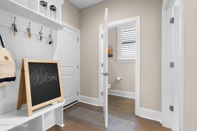 9036 Island Rider Ct NE, Leland, NC 28451 - mudroom with baseboards and dark wood-type flooring