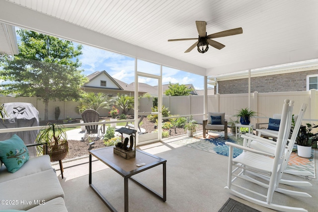 9036 Island Rider Ct NE, Leland, NC 28451 - sunroom / solarium featuring ceiling fan and outdoor lounge area