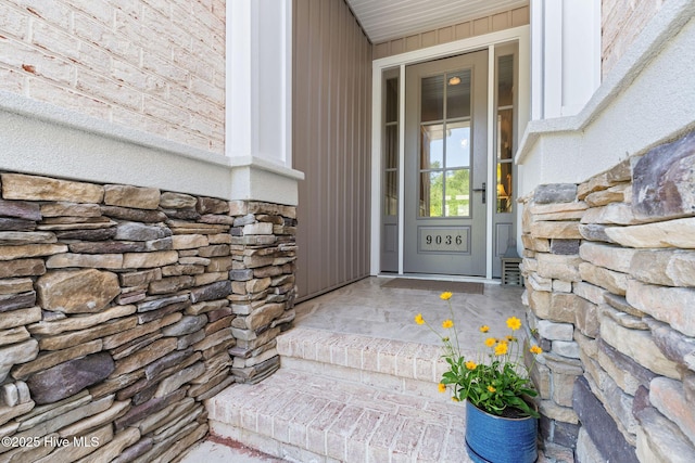 9036 Island Rider Ct NE, Leland, NC 28451 - doorway to property with stone siding