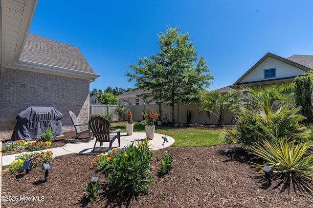 9036 Island Rider Ct NE, Leland, NC 28451 - view of yard featuring fence and a patio area