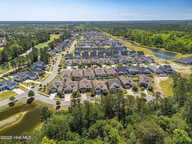 9036 Island Rider Ct NE, Leland, NC 28451 - birds eye view of property with a residential view, a water view, and a forest view