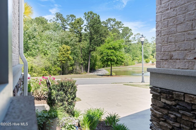 9036 Island Rider Ct NE, Leland, NC 28451 - view of patio / terrace featuring a water view